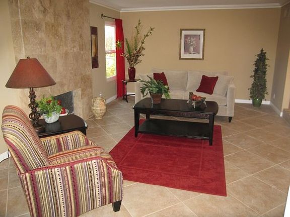 Living Room with Travertine fireplace