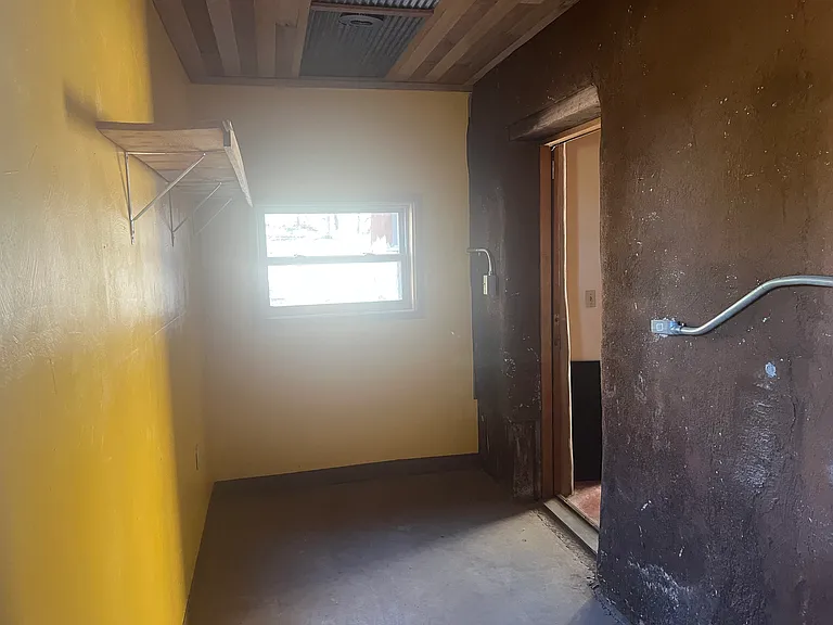 Mudroom & entrance to laundry room and studio