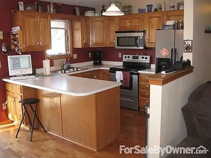 Open kitchen
						:
						Stainless look matching appliances new in 2008