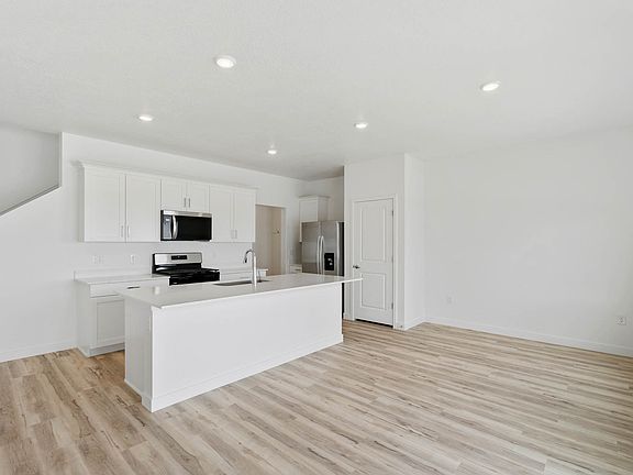 The kitchen has a wonderful kitchen island.