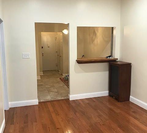 Living Room w/ Dining Room Area