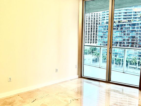 Master king size bedroom with full glass sliding door to access the balcony