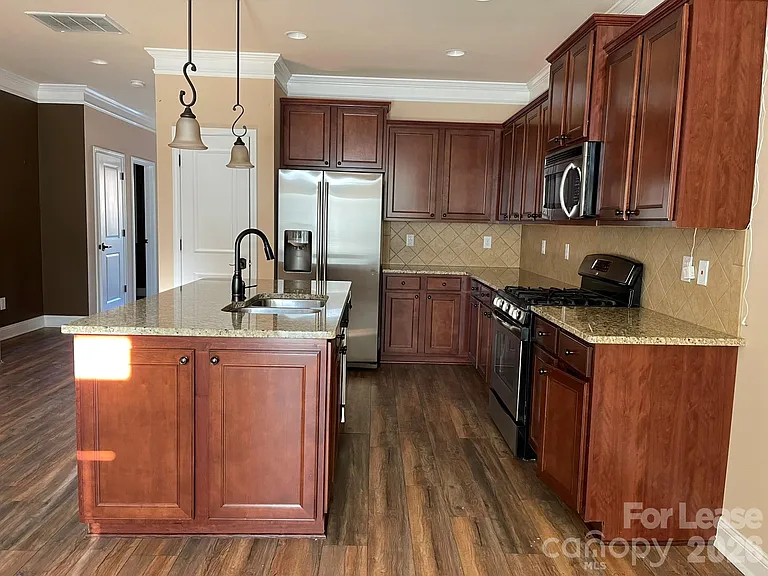 9596 Audley End Ct NW — Photo 4