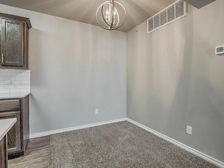 Experience comfort in this cozy dining nook, perfect for intimate meals.