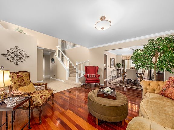 ~Brazilian Cheery floors adorn the Living & Dining rooms~