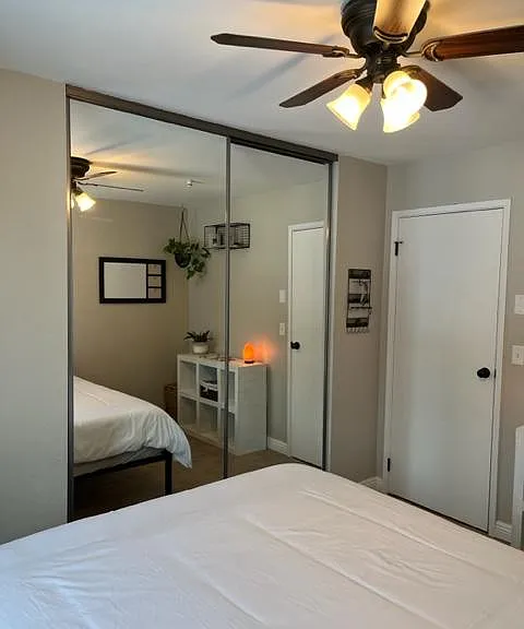 View of extra-large mirrored wardrobe.