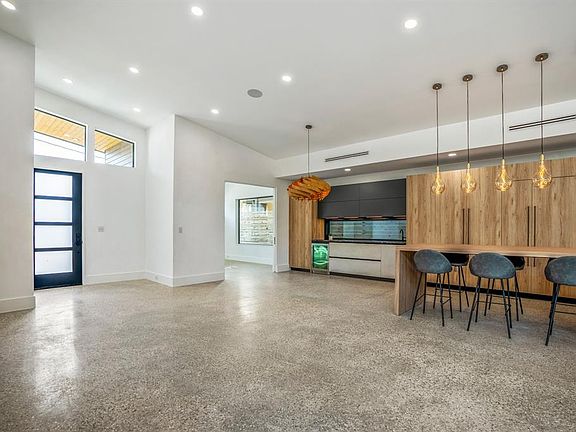 Full wet bar with wine cooler.