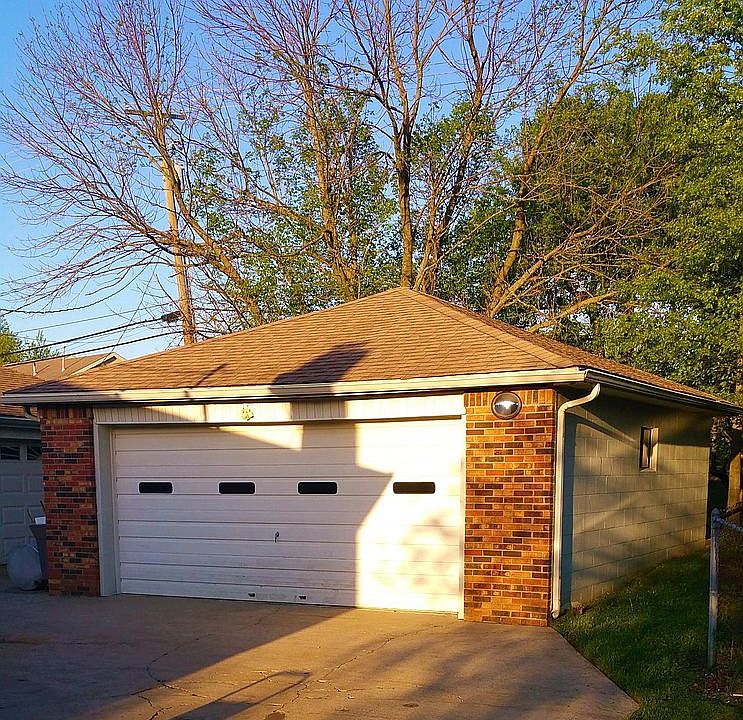 single garage with shelving 