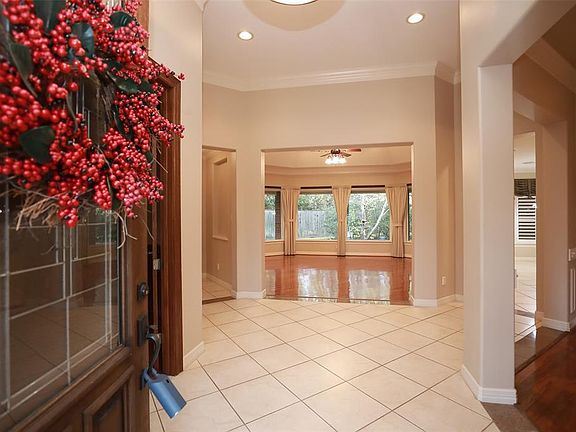 You will be amazed from the moment you enter the home! Soaring ceilings with crown molding throughout and an abundance of windows reflecting the beauty of the spacious backyard.