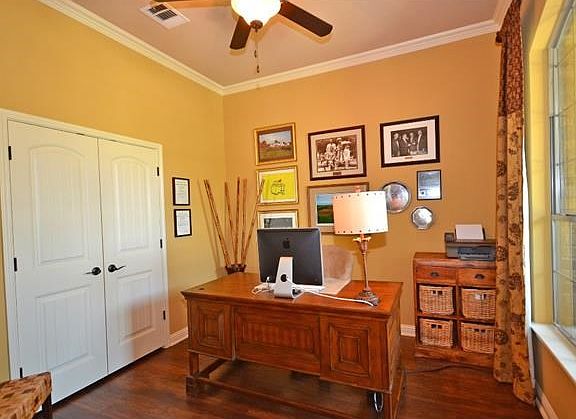 Stay efficient and organized with this private study. With the large closet, this room could also be