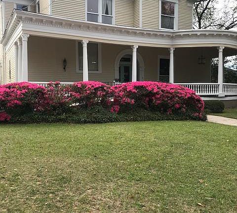 front of Arlington Place in Springtime with the Azaleas blooming