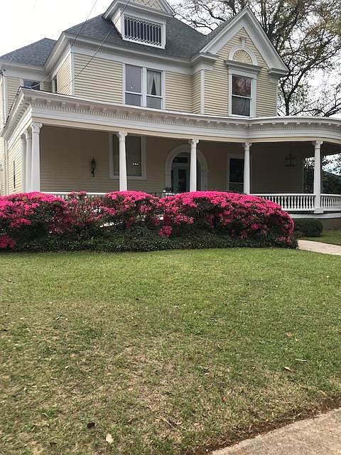 front of Arlington Place in Springtime with the Azaleas blooming