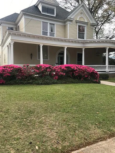front of Arlington Place in Springtime with the Azaleas blooming