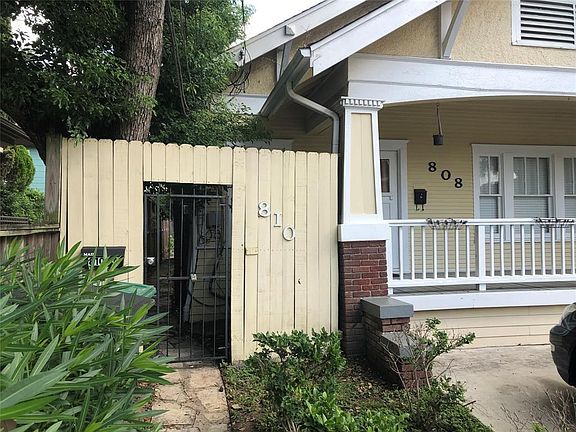 Another view of the front gate that opens to the pathway leading to this home. This gate remains locked.