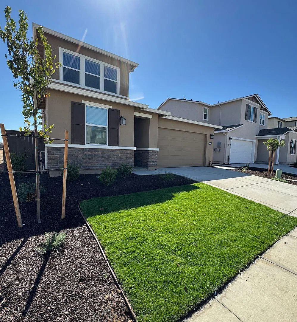 Brand-New Natomas Home! 3 Bedrooms + Loft | Downstairs Primary Suite | Pool & Clubhouse — Photo 2