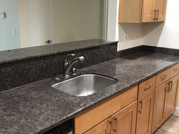 Open floor plan so kitchen faces living room