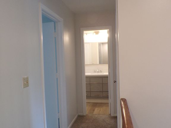 upper hallway to both bedrooms and full bath
