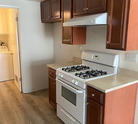 Kitchen.
Stove and place for refrigerator