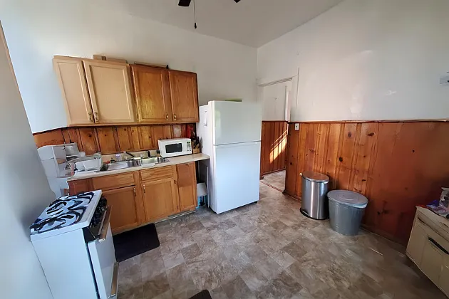 Large eat in kitchen with access to the backyard. Perfect for bringing groceries in or taking trash out.
