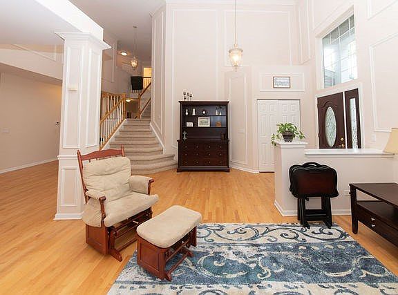 Beautiful Wall Board Molding with refinished hardwood floors