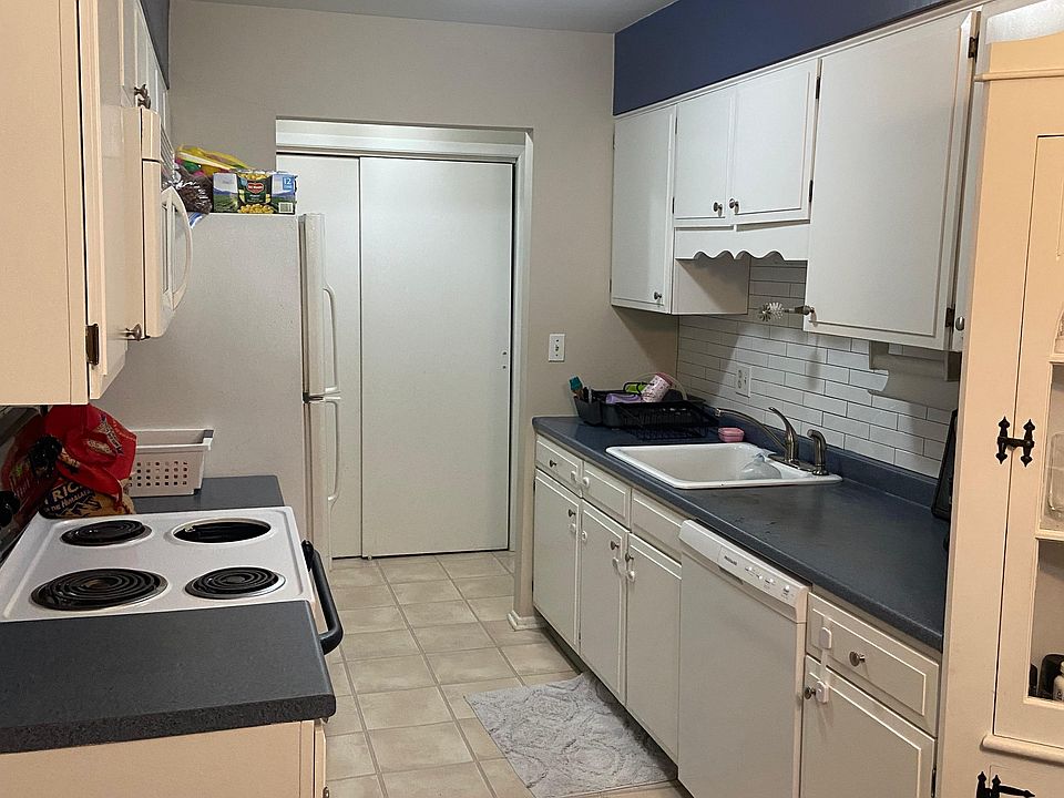 Kitchen freshly painted with new backsplash