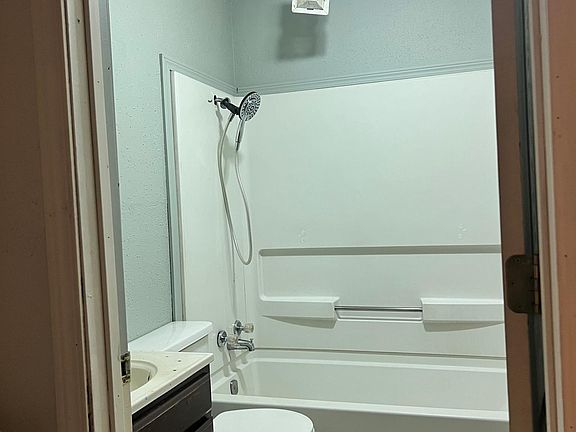 Bath, fresh paint and bluetooth ceiling fan being installed.