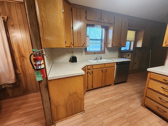 Kitchen area with pantry storage area.