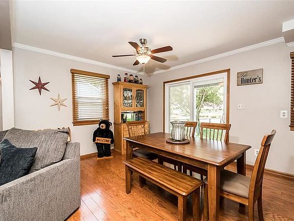 Dining area open to living room and kitchen with access to the back yard and hardwood floors!