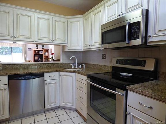 Remodeled Kitchen with pass...