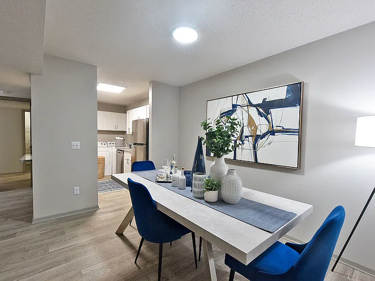 Dining area with hardwood-style flooring