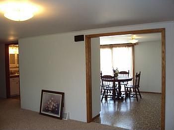 The kitchendining area has a sliding glass door to the deck. New vinyl flooring.