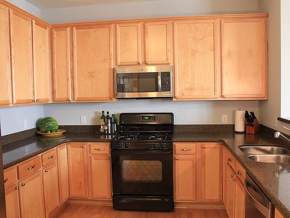Spacious kitchen with ample counter and cabinet space.