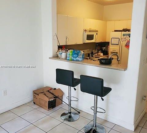 2nd image of 1666 SE 27th Ct Unit 105