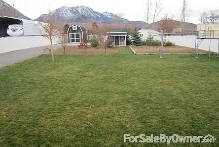 Large backyard, garden space, and Shed
						:
						Playpad-Basketball court, and playhouse