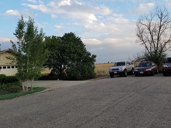 Parking area in front of house at dead end road