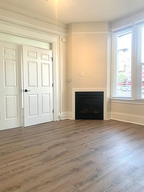 Beautiful living room with natural light from East facing windows.