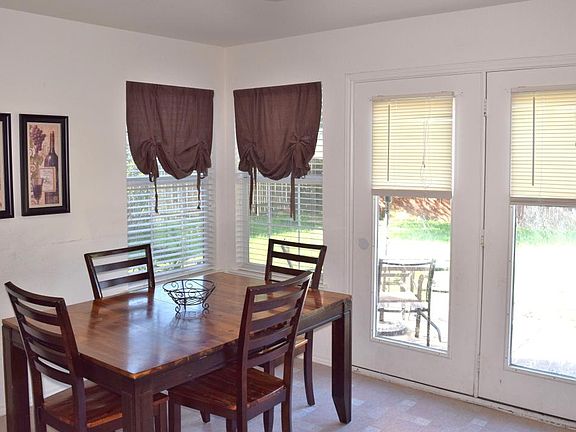 Sunny dining nook, French Doors to patio & yard.