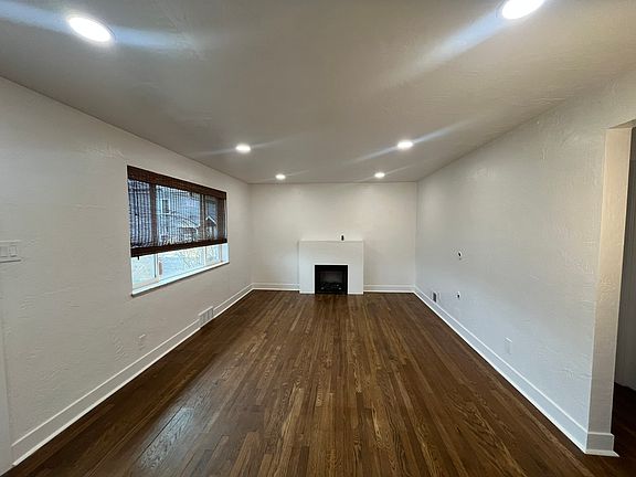 Ample sized living room with electric fireplace