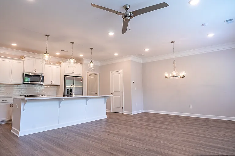 Open plan. View of kitchen and dining area.