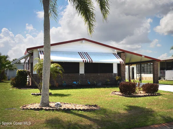 919 Dogwood Dr, Barefoot Bay, FL 32976