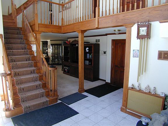 Open Grand Entry Hall with inside fountain