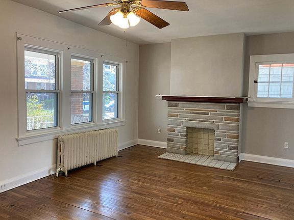 this is an old photo--custom radiator cover on top, plenty of room for lounging with a book by the window!