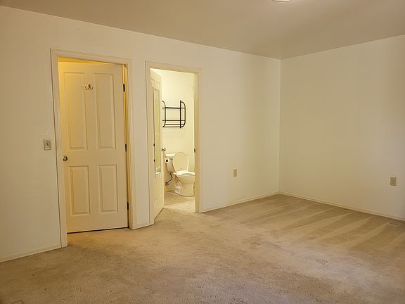 Master bedroom with bathroom and closet
