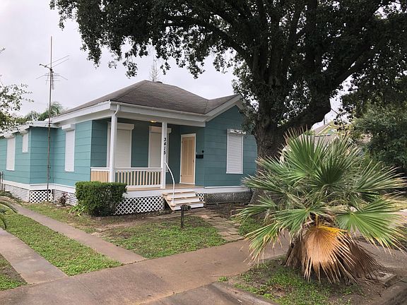Wonderful front patio porch for enjoying the breeze. Bonus addition - brand new roll-up storm shutters for letting in the natural light or total blackout.