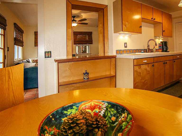 Large Open Kitchen / breakthrough to Living Room / extra storage area (back)