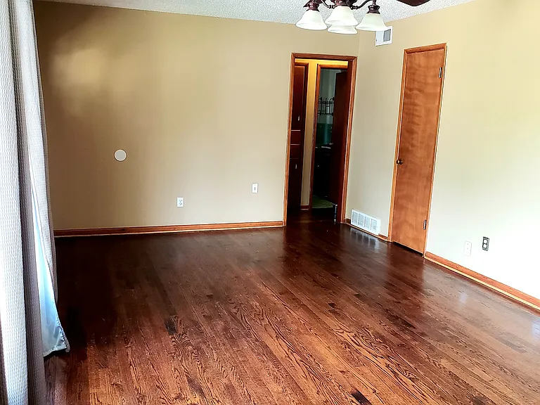 Living look east to hall