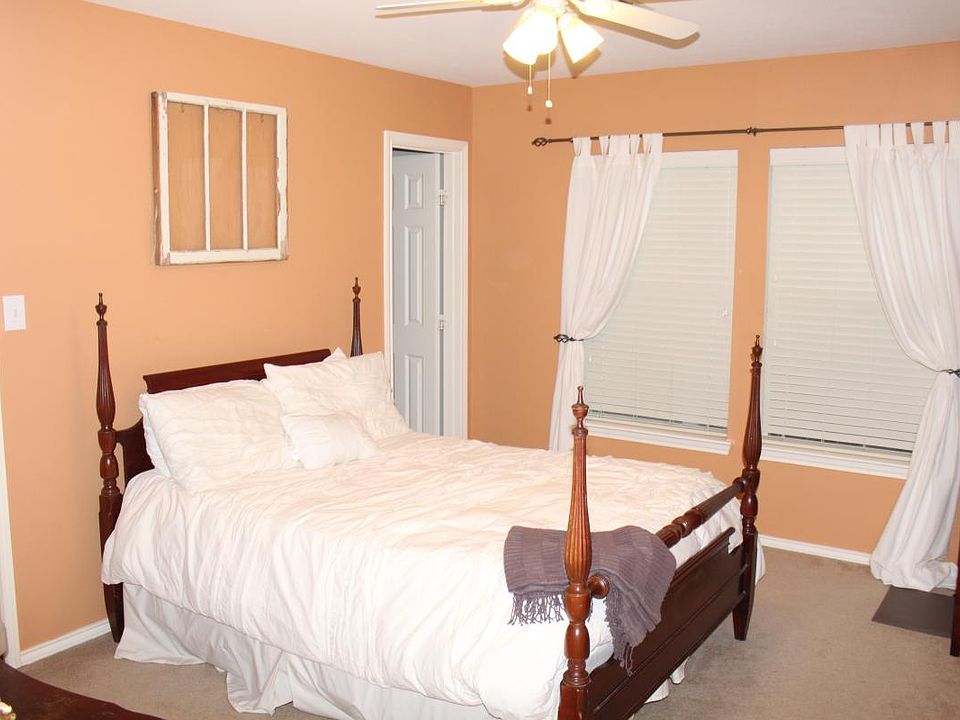 3rd floor bedroom has been updated with new paint and hardwood floors