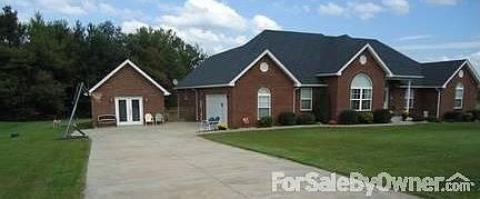 driveway with detached garage