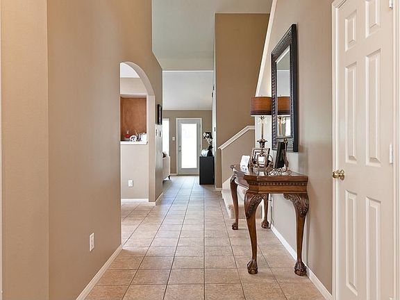 The two-story entry way also has ceramic tile floors.