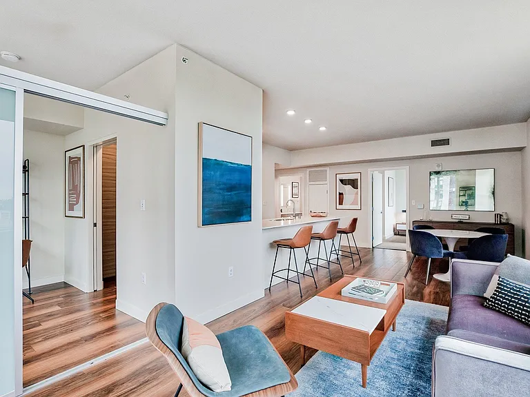 Flexible living spaces with continuous wood floors